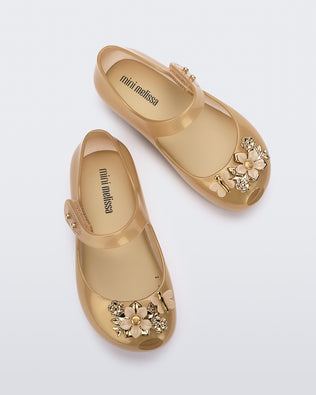 Product element, title Ultragirl Chrome Flower in Gold Pearl
 price $39.00