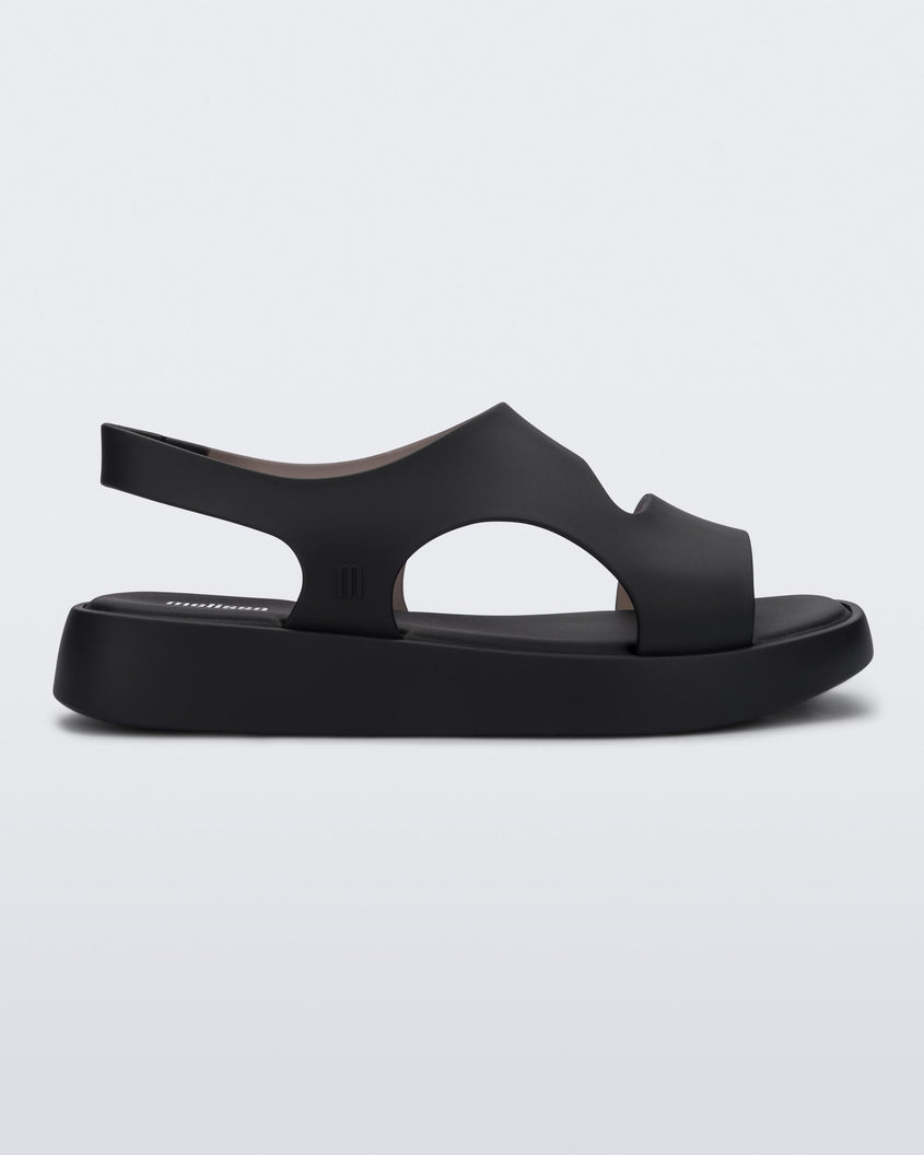 Side view of a black Melissa Franny sandal with straps.