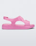 Side view of a pink Melissa Franny sandal with straps.