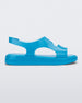 Side view of a blue Melissa Franny sandal with straps.