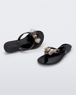 Product element, title Harmonic Bugs in Black/Metallic Black
 price $23.60