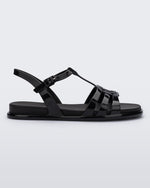 Side view of a Melissa Party sandal in black with back ankle strap and buckle closure 