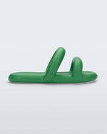 Side view of a green Melissa Free Bloom Slide with puffer-like straps. 