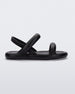Side view of a black Melissa Free Bloom Sandal with puffer-like straps.