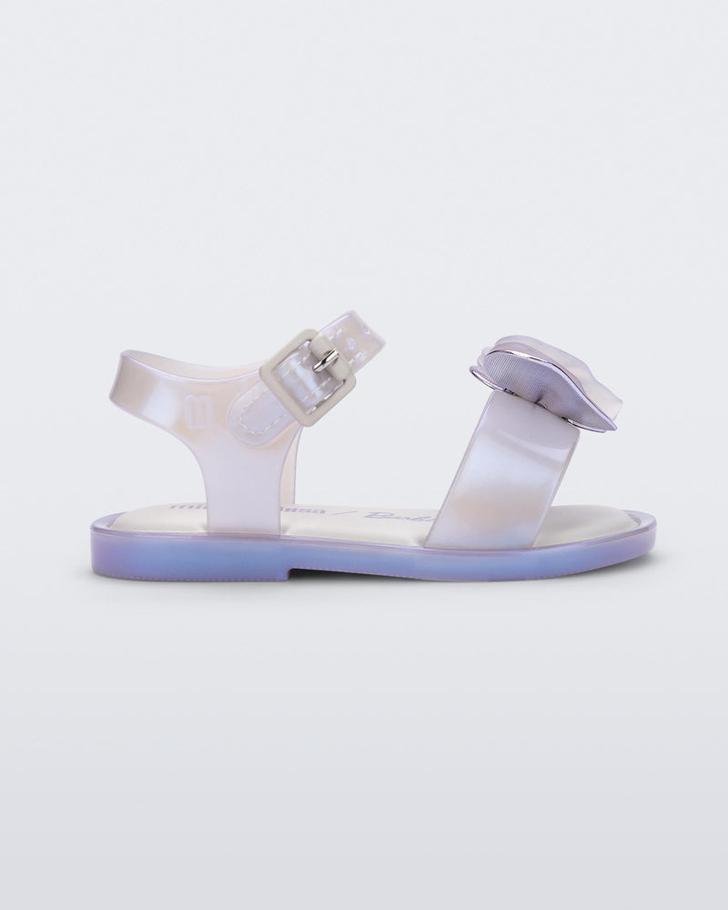 Side view of a pearly blue Mini Melissa Mar Sandal with a heart shaped bow and buckle.
