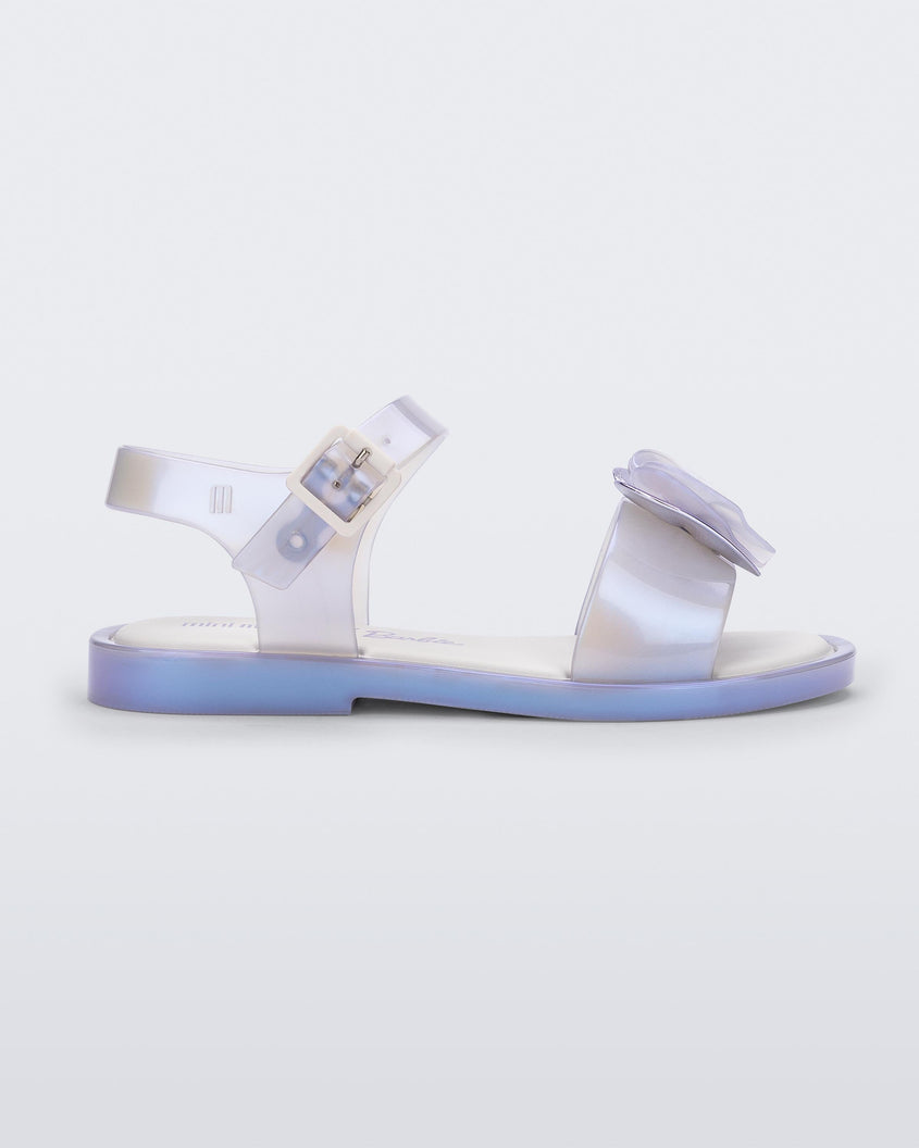 Side view of a pearly blue Mini Melissa Mar Sandal with a bow.