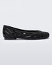 Side view of a black Melissa Femme Classy flat with a woven design.