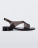 Side view of a black Melissa The Real Jelly Paris sandal with two front straps and an ankle strap.