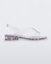 Side view of a clear Melissa The Real Jelly Paris sandal with two front straps and an ankle strap.