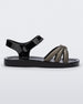 Side view of a black glitter Mini Melissa Precious sandal with three black glitter front straps joining in the middle and a black ankle strap.