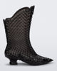 Side view of a clear black Melissa Court Boot with a short heel, heart detail on the front and a checkered pattern texture.
