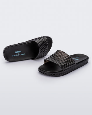 Product element, title Court Slide in Transparent Black
 price $111.30