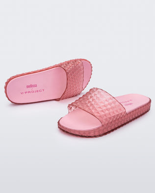 Product element, title Court Slide in Transparent Pink
 price $111.30