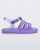Side view of a lilac Mini Melissa Freesherman with lilac and clear glitter straps.