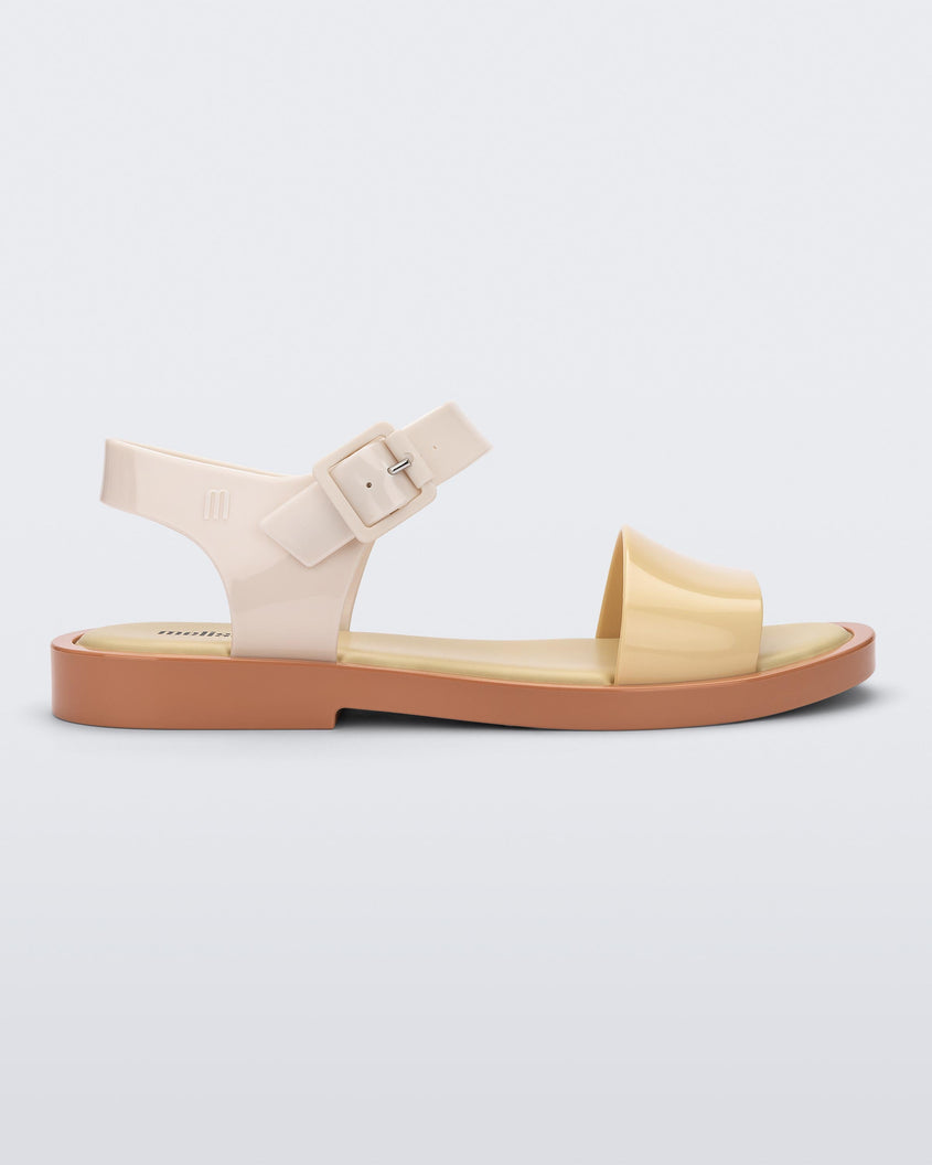 Side view of a beige/yellow Melissa Mar Sandal with two straps.