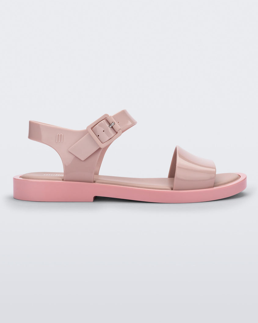 Side view of a pink Melissa Mar Sandal with two straps.