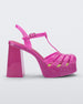 Side view of a glitter pink Melissa Party Heel with several straps and a closed toe front.
