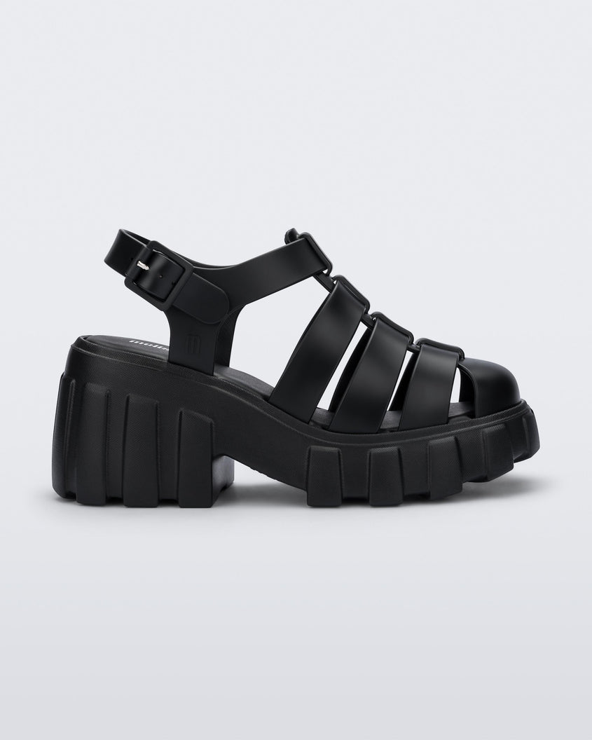 Side view of a black Melissa Megan platform heel sandal.