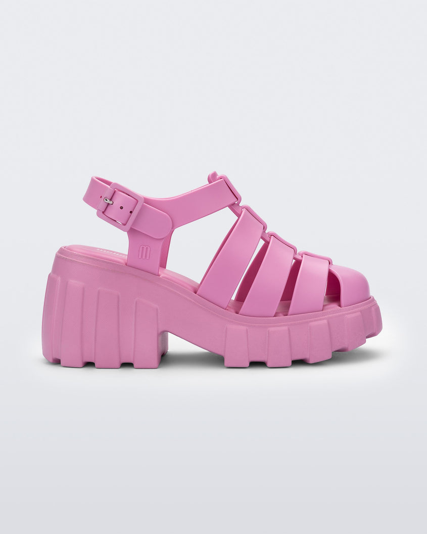 Side view of a pink Melissa Megan platform heel sandal.