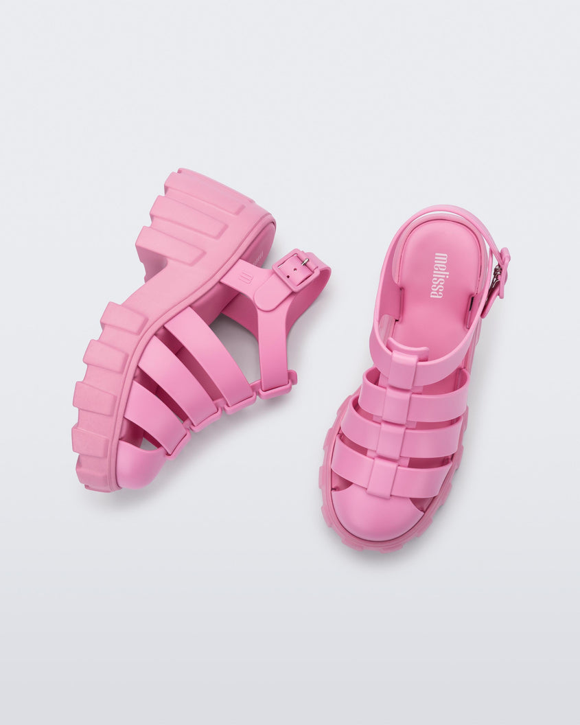 Top and side view of a pair of pink Melissa Megan platformheel sandals.