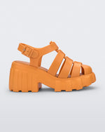 Side view of a orange Melissa Megan platform heel sandal.