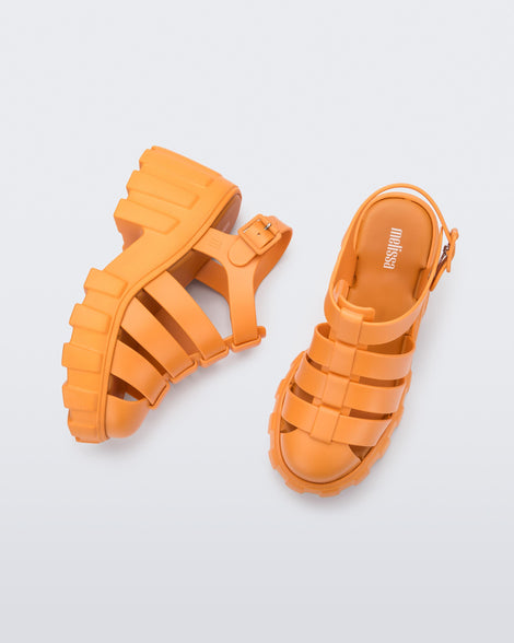 Top and side view of a pair of orange Melissa Megan platformheel sandals.