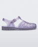 Side view of a glitter lilac Melissa Possession sandal with several straps and a closed toe front.