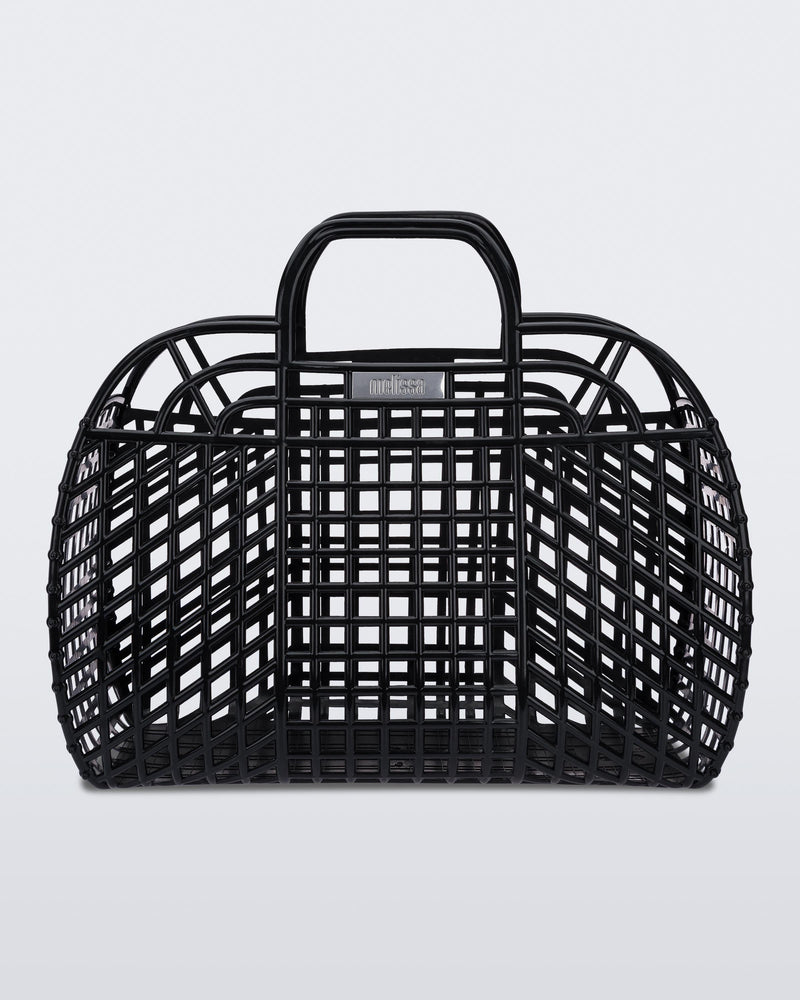 Front view of a black Refraction bag with handles