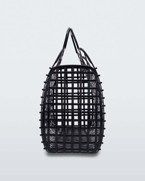 Side view of a black Refraction bag with handles