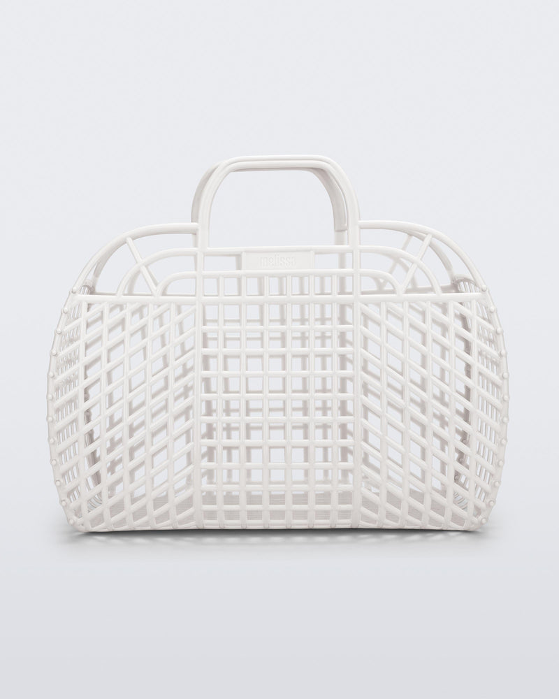 Front view of a white Refraction bag with handles