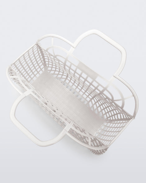 Top view of a white Refraction bag with handles