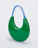 An angled front view of a Green/Blue Melissa Moon Bag with a crescent shaped green bag base and a blue beige top strap.
