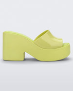 Side view of a Melissa Posh platform slide in Yellow
