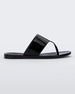 Side view of a black Melissa Essential Chic Flip Flop with a wide upper strap.