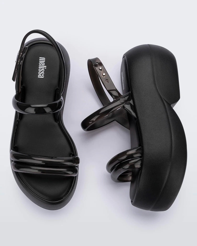 Top and side view of a pair of black Melissa Airbubble Platform sandals.