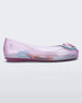Side view of a purple Mini Melissa Sweet Love Princess flat, with a purple base, Ariel in script on the side, a sea shell detail on the toe, and a drawing of Ariel of The Little Mermaid on the sole.