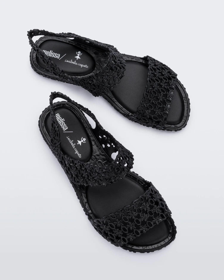 Top view of a pair of black Melissa Panc Sandals.