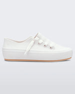 An outter side view of a white/beige Melissa Ulitsa sneaker with a white base, laces and a beige sole.