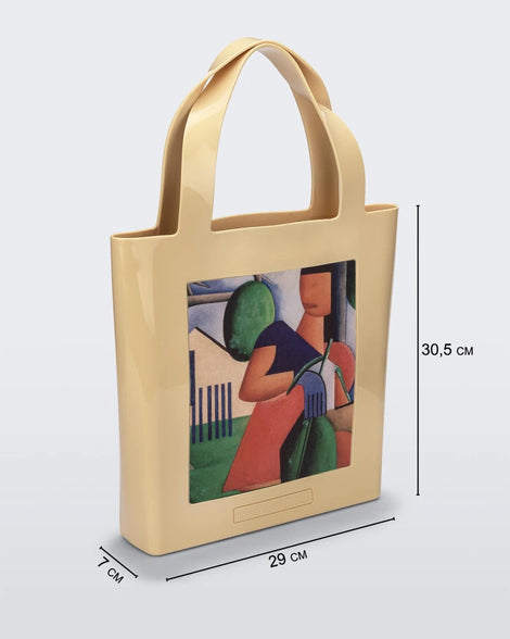 An Adult Melissa Canvas + Tarsila Do Amaral Bag with a picture of a woman holding a child.