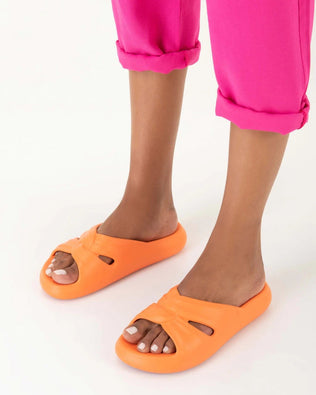 Product element, title Free Slide in Orange
 price $35.60