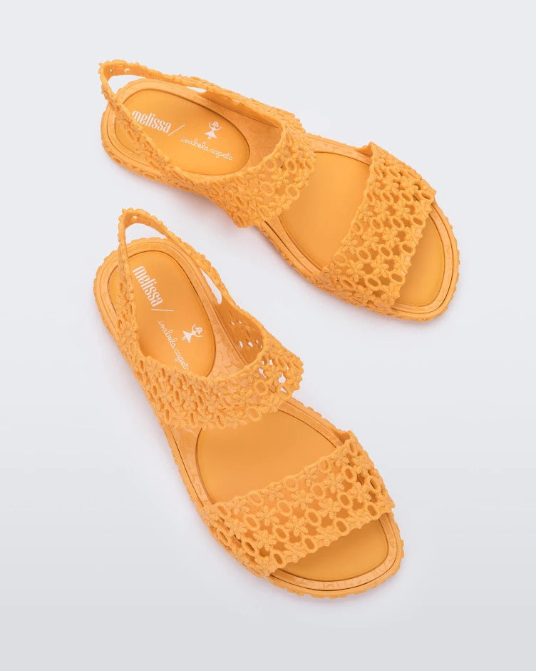 Top view of a pair of yellow Melissa Panc Sandals.