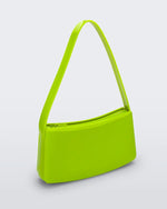 Angled view of neon green Melissa Baguete handbag.