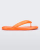 Side view of orange Melissa Airbubble Flip Flop.