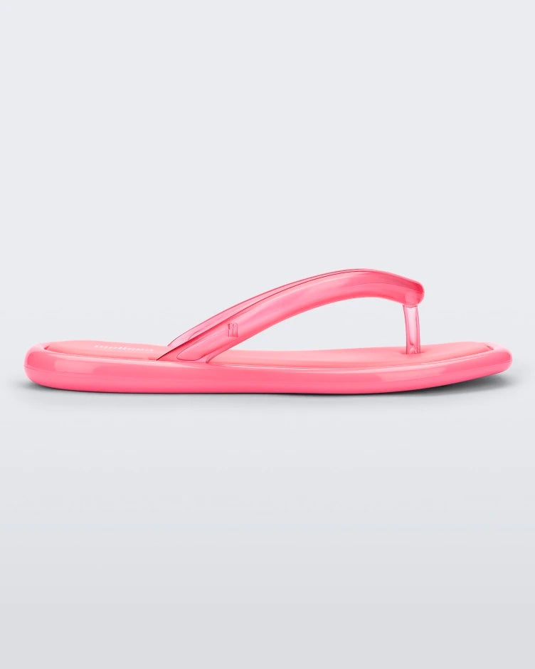 Side view of pink Melissa Airbubble Flip Flop.