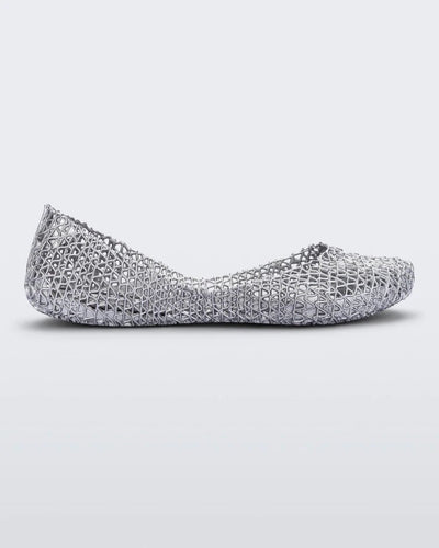 Side view of a silver glitter Melissa Campana ballet flat.
