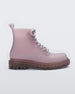 Side view of a matte beige/ pastel Lilac Melissa Coturno boot with a lilac base, beige laces and lilac sole.