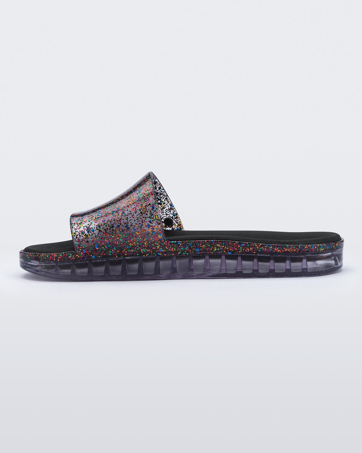 inside view of a clear/glitter Melissa Beach slide.