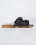 Side view of a Melissa Wide Slide sandal with gold speckled sole and two black front straps