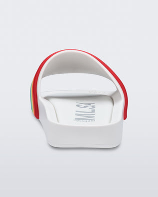 Back view of a white rainbow Melissa Rainbow Beach slide with a white sole and a rainbow top strap.