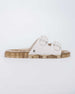 Side view of a Melissa Wide slide sandal with gold glitter sole and white double straps with buckles